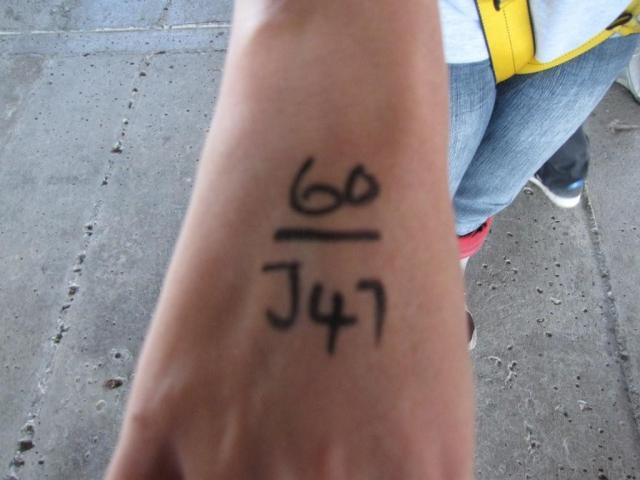I suppose its incase you get smashed into a million pieces at the bottom that they magic mark your hands before jumping